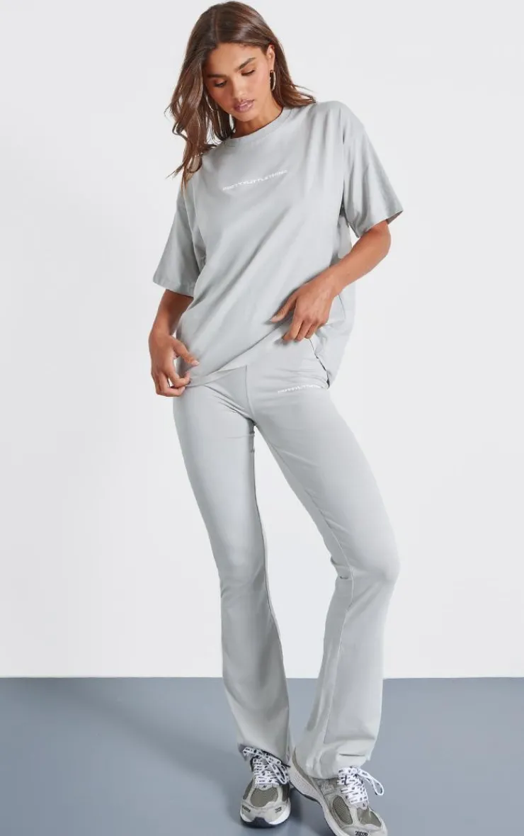 New PrettyLittleThing Pale Grey Printed Flared Pants Moss Grey