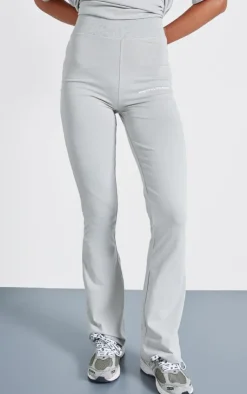 New PrettyLittleThing Pale Grey Printed Flared Pants Moss Grey