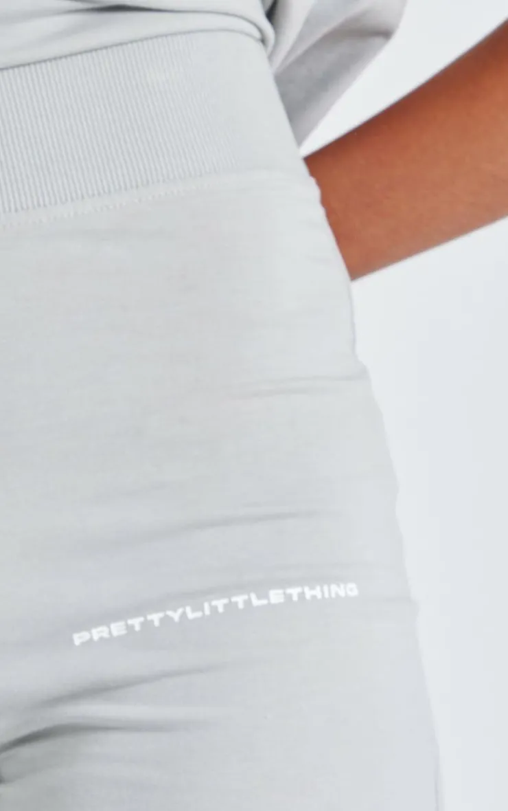 New PrettyLittleThing Pale Grey Printed Flared Pants Moss Grey