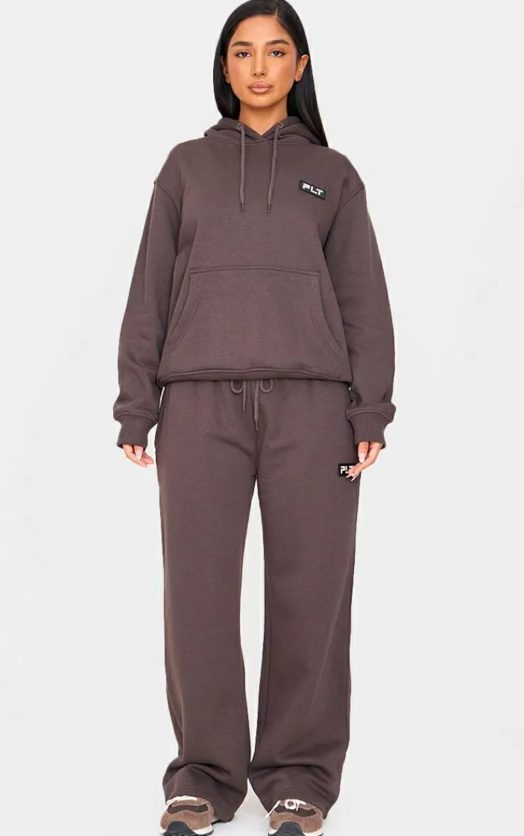 PrettyLittleThing Graphic Sweatsuits*Petite Badge Detail Oversized Hoodie