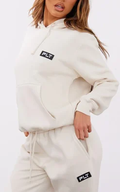 PrettyLittleThing Cream Sweatsuits*Petite Badge Detail Straight Leg Sweatpants