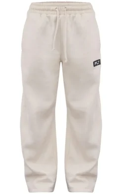 PrettyLittleThing Cream Sweatsuits*Petite Badge Detail Straight Leg Sweatpants