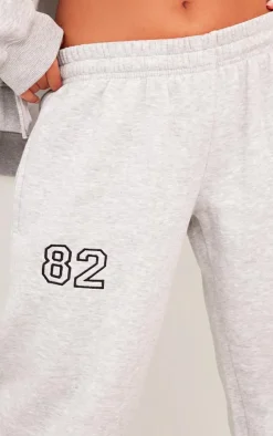 Discount PrettyLittleThing Petite 82 Varsity Wide Leg Sweatpants Ash Grey