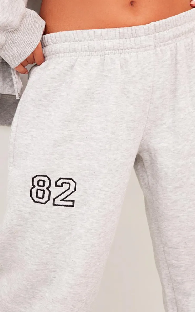 Discount PrettyLittleThing Petite 82 Varsity Wide Leg Sweatpants Ash Grey