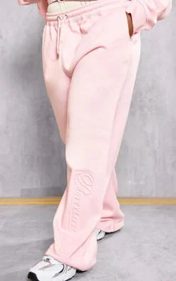 Online PrettyLittleThing Plus Embossed Graphic Straight Leg Sweatpants Baby Pink