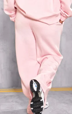 Online PrettyLittleThing Plus Embossed Graphic Straight Leg Sweatpants Baby Pink