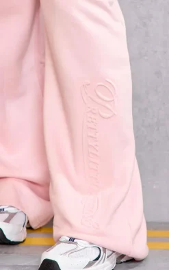 Online PrettyLittleThing Plus Embossed Graphic Straight Leg Sweatpants Baby Pink
