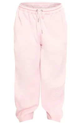 Online PrettyLittleThing Plus Embossed Graphic Straight Leg Sweatpants Baby Pink