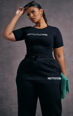 PrettyLittleThing Black Sweatsuits*Plus Cap Sleeve Bodysuit