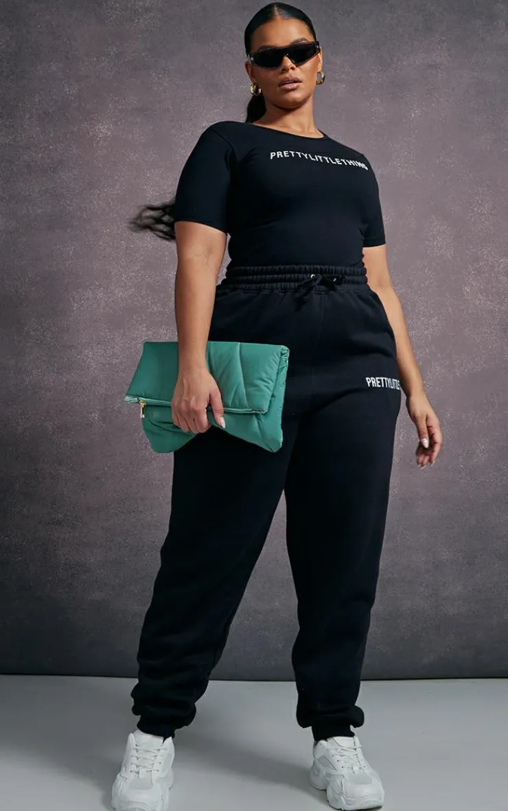 PrettyLittleThing Black Sweatsuits*Plus Cap Sleeve Bodysuit