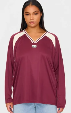 PrettyLittleThing T-Shirts*Plus Studio Mode Long Sleeve Football T-shirt