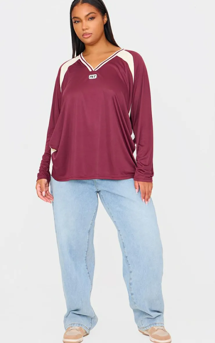PrettyLittleThing T-Shirts*Plus Studio Mode Long Sleeve Football T-shirt