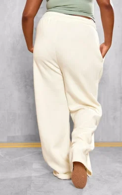 PrettyLittleThing Cream Sweatsuits*Plus Athletics Club Embroidered Wide Leg Sweatpants