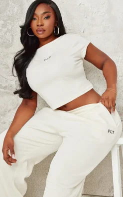 Online PrettyLittleThing Plus Contrast Embroidery Fitted Cap Sleeve T Shirt Cream