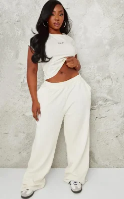 New PrettyLittleThing Plus Contrast Embroidery Low Rise Wide Leg Sweatpants Cream