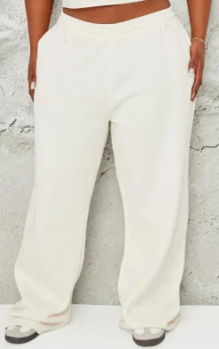 New PrettyLittleThing Plus Contrast Embroidery Low Rise Wide Leg Sweatpants Cream