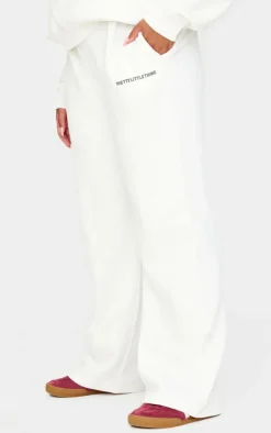 PrettyLittleThing Cream Sweatsuits*Plus Contrast Print Wide Leg Sweatpants