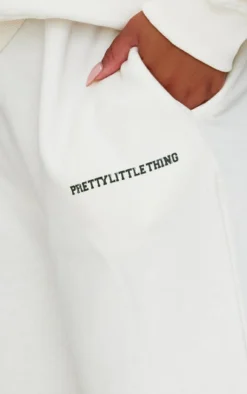 PrettyLittleThing Cream Sweatsuits*Plus Contrast Print Wide Leg Sweatpants