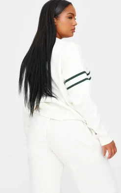 PrettyLittleThing Cream Sweatsuits*Plus Contrast Print Oversized Sweatshirt