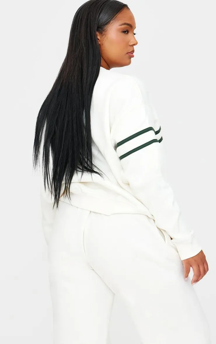 PrettyLittleThing Cream Sweatsuits*Plus Contrast Print Oversized Sweatshirt