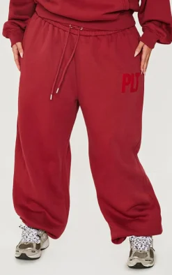 New PrettyLittleThing Plus Borg Applique Cuffed Sweatpants Dark Red