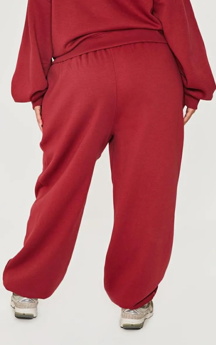 New PrettyLittleThing Plus Borg Applique Cuffed Sweatpants Dark Red