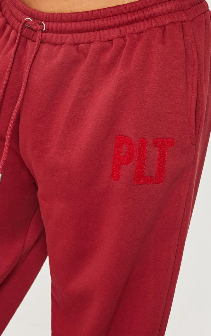 New PrettyLittleThing Plus Borg Applique Cuffed Sweatpants Dark Red