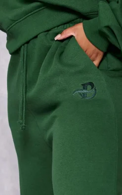 Online PrettyLittleThing Plus Logo Embroidered Wide Leg Sweatpants Forest Green
