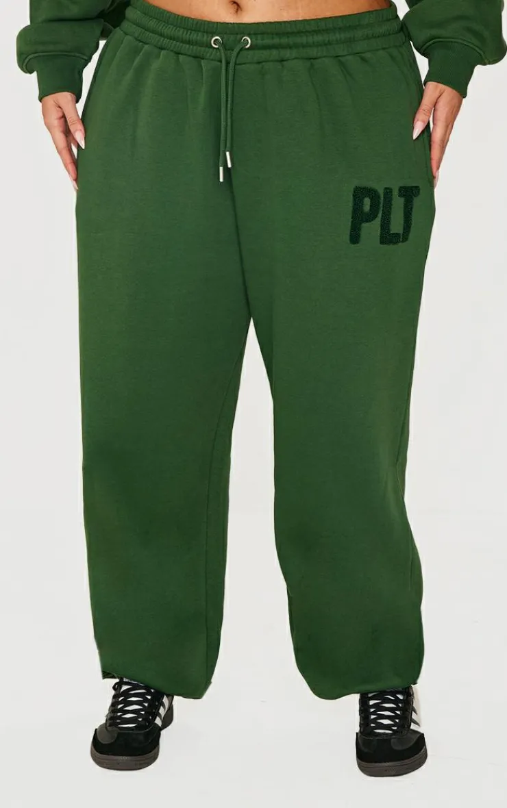 PrettyLittleThing Plus Borg Applique Cuffed Sweatpants Forest Green
