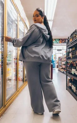 PrettyLittleThing Grey Sweatsuits*Plus Washed Badge Detail Zip Up Hoodie