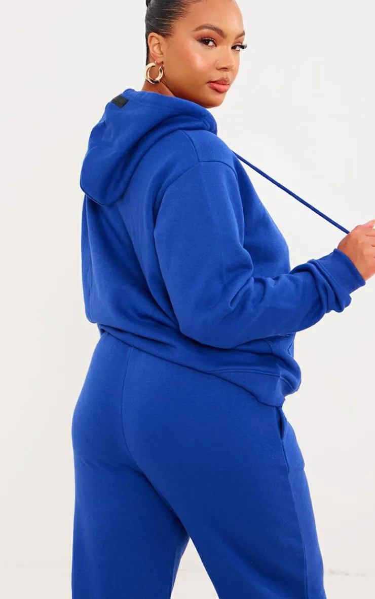 PrettyLittleThing Blue Sweatsuits*Plus Badge Detail Hoodie