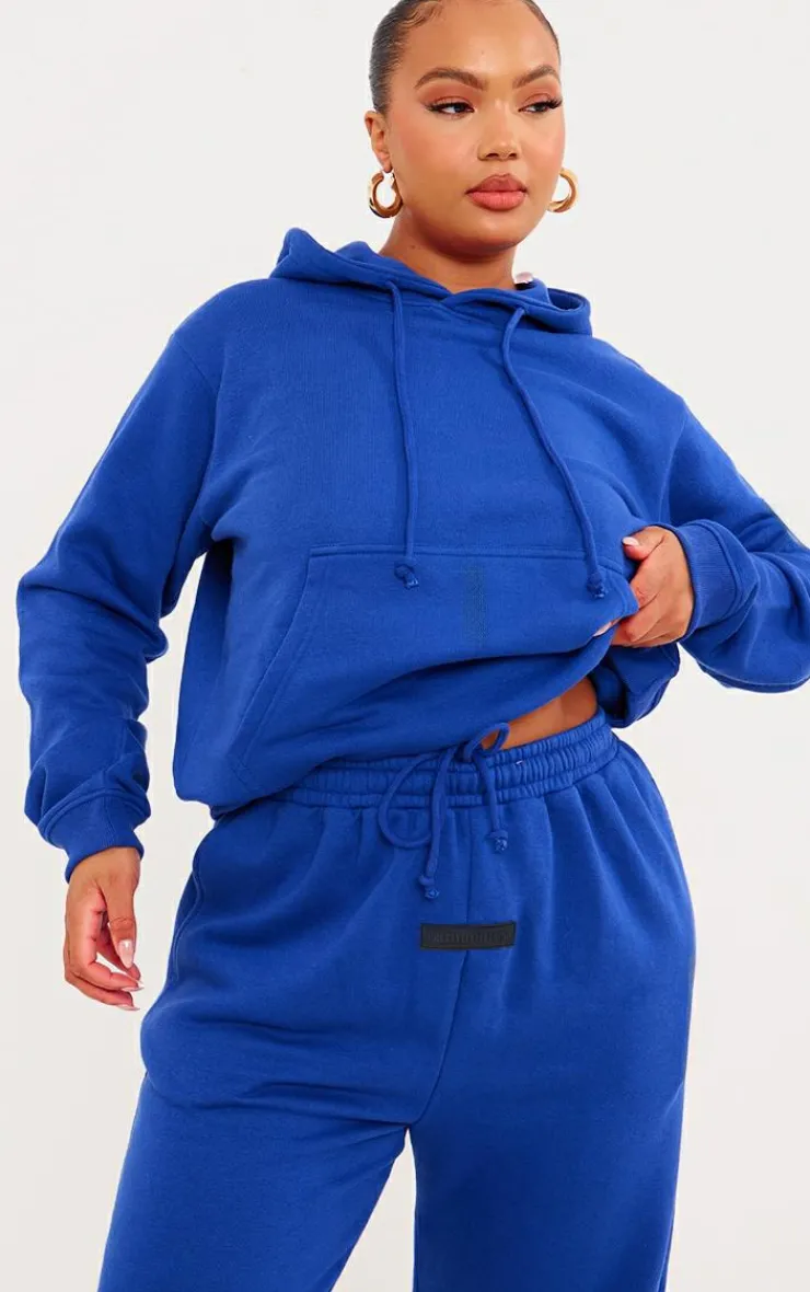 PrettyLittleThing Blue Sweatsuits*Plus Badge Detail Hoodie