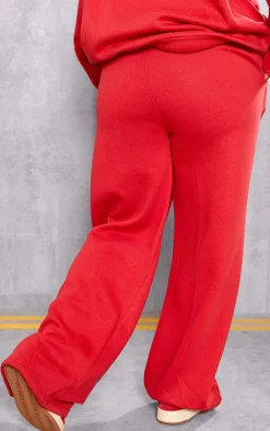 Sale PrettyLittleThing Plus Embossed Graphic Straight Leg Sweatpants Red