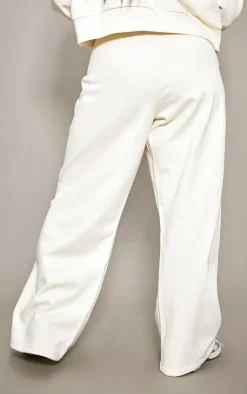 Discount PrettyLittleThing Plus Printed Premium Wide Leg Sweatpants Sand