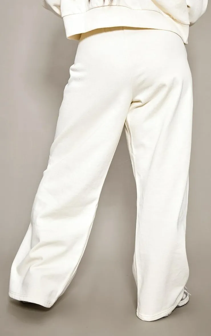 Discount PrettyLittleThing Plus Printed Premium Wide Leg Sweatpants Sand