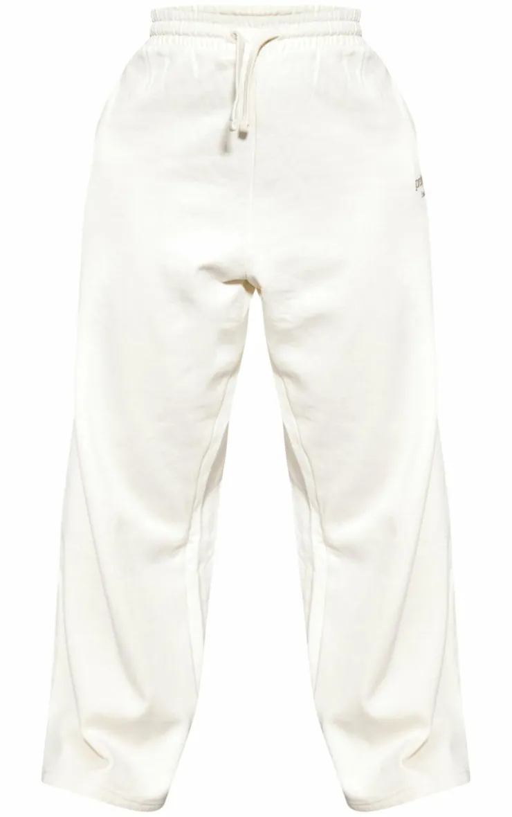 Discount PrettyLittleThing Plus Printed Premium Wide Leg Sweatpants Sand