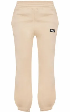 New PrettyLittleThing Badge Detailed Straight Leg Sweatpants Sand