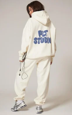 PrettyLittleThing Cream Sweatsuits*Premium Studio Print Oversized Hoodie