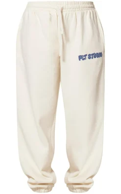 PrettyLittleThing Cream Sweatsuits*Premium Studio Print Cuffed Sweatpants