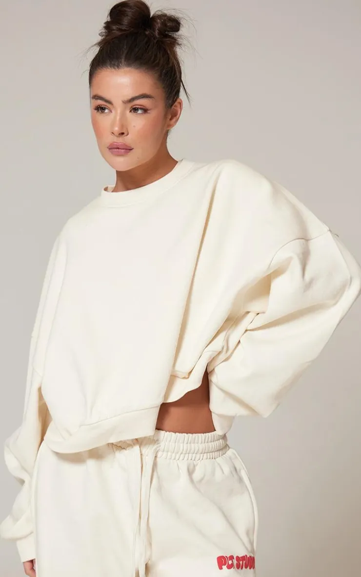PrettyLittleThing Cream Sweatsuits*Premium Studio Print Boxy Sweatshirt