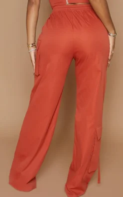 Discount PrettyLittleThing Shape Cargo Pocket Detail Wide Leg Sweatpants Rust