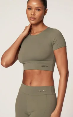 PrettyLittleThing Workout Tops*Sport Metal Badge Sculpt Short Sleeve Top