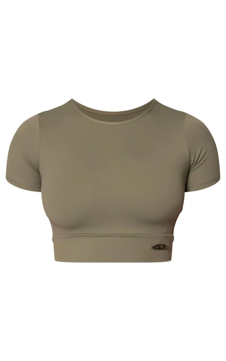 PrettyLittleThing Workout Tops*Sport Metal Badge Sculpt Short Sleeve Top
