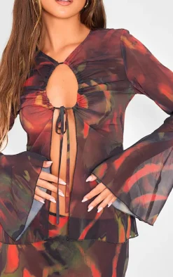 Online PrettyLittleThing Leaf Print Chiffon Key Hole Front Tie Fluted Sleeve Top Red
