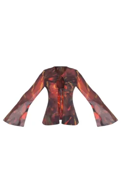 Online PrettyLittleThing Leaf Print Chiffon Key Hole Front Tie Fluted Sleeve Top Red