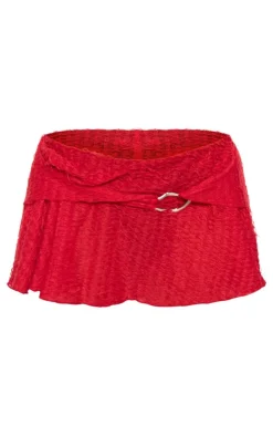 Online PrettyLittleThing Textu Ring Detail Micro Mini Skirt Red