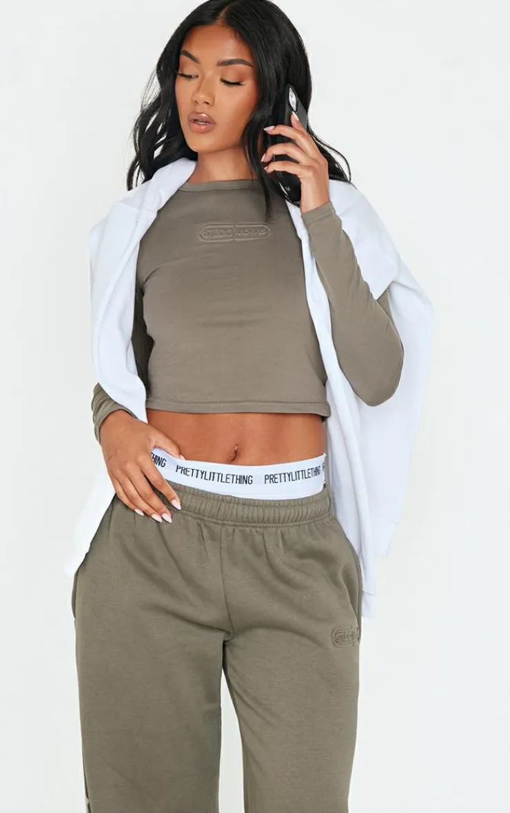 Discount PrettyLittleThing Embossed Studio Archives Long Sleeve Baby T Shirt Sage Khaki
