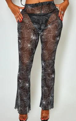 PrettyLittleThing Shape Cobweb Printed Mesh Flare Pants Black
