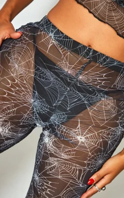 PrettyLittleThing Shape Cobweb Printed Mesh Flare Pants Black