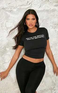 PrettyLittleThing T-Shirts*Shape Demure Graphic Baby Tee